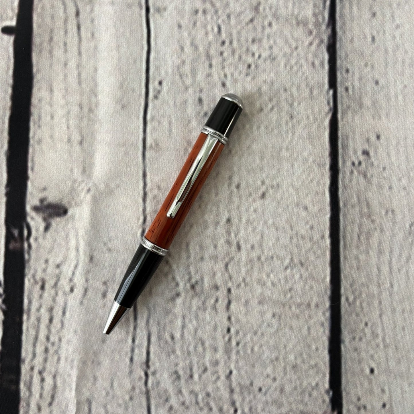 Gatsby Twist ballpoint pen with redheart, black and chrome fittings