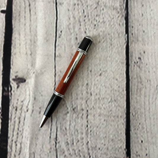 Gatsby Twist ballpoint pen with redheart, black and chrome fittings
