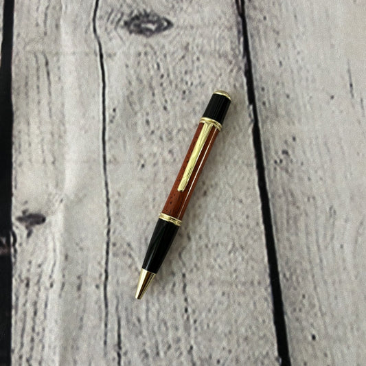 Gatsby Twist ballpoint pen with African padauk wood, black and gold fittings