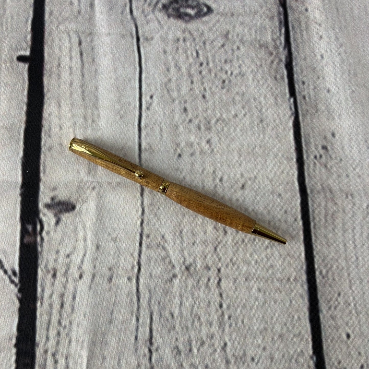 Slimline ballpoint pen with Hawaiian koa and gold fittings