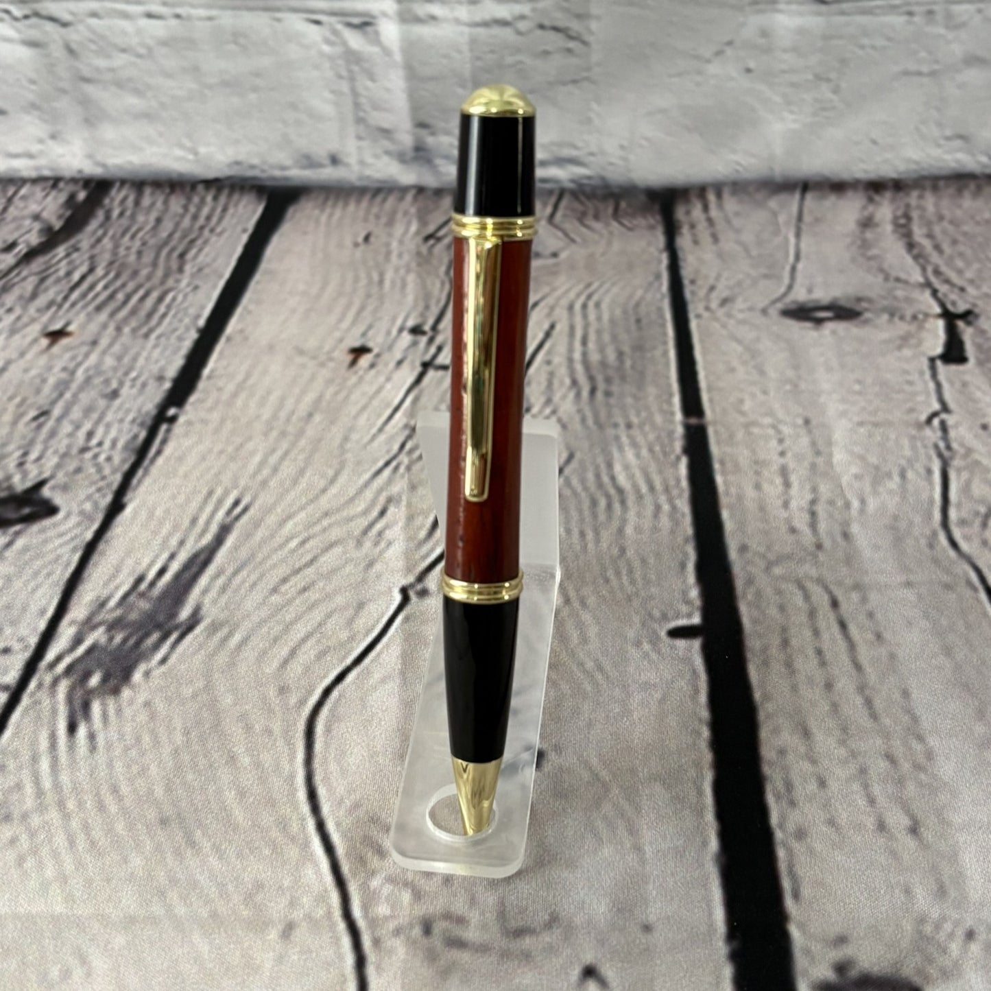 Gatsby Twist ballpoint pen with African padauk wood, black and gold fittings