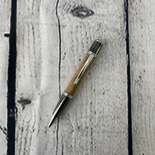 Gatsby Twist ballpoint pen with red oak, black and chrome fittings
