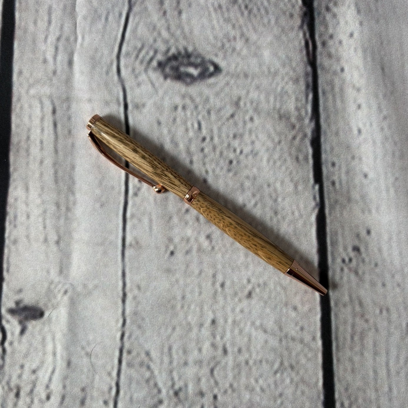 Slimline ballpoint pen with white oak and gold fittings