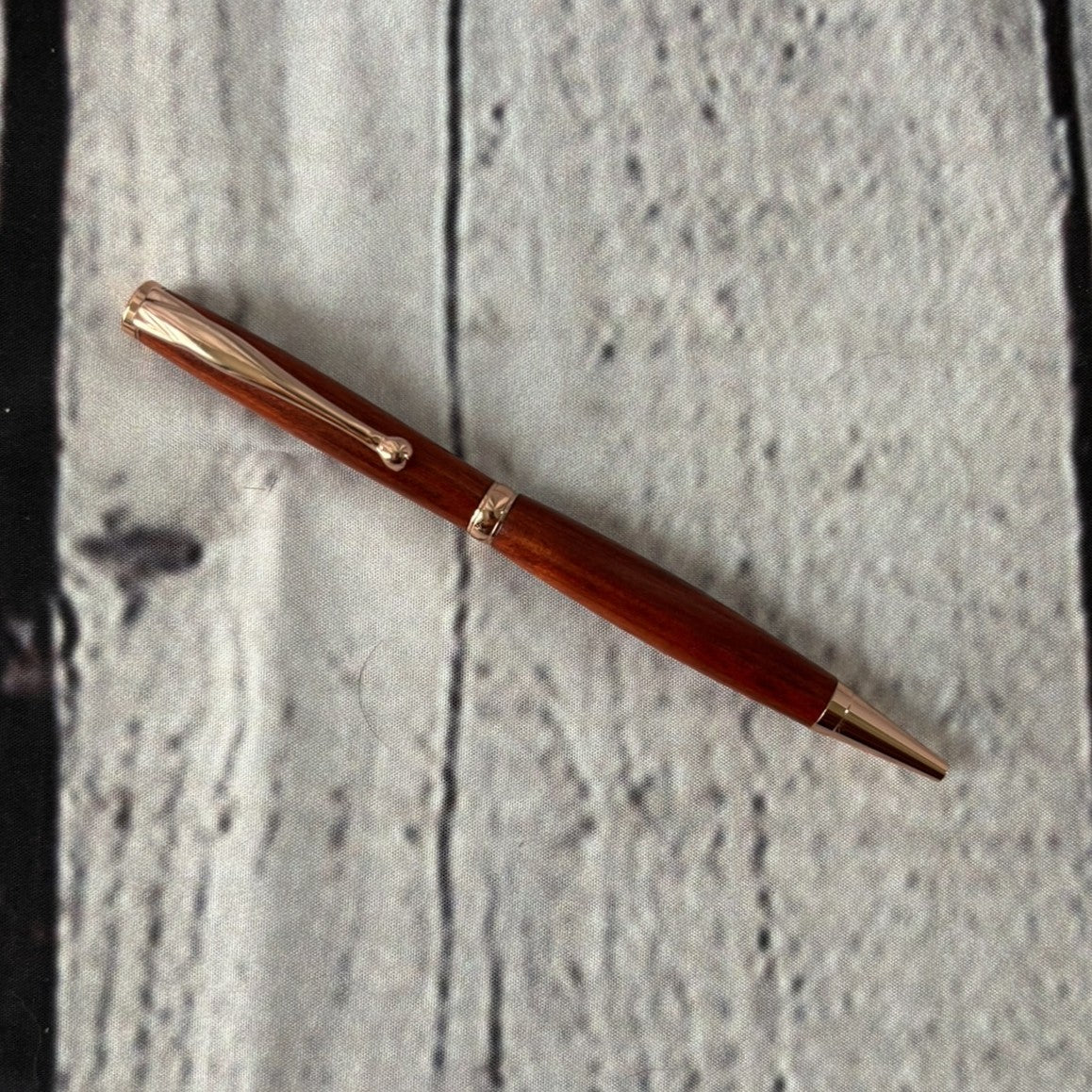Slimline ballpoint pen with red heart and gold fittings