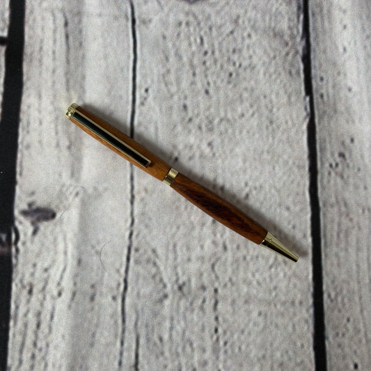 Slimline ballpoint pen with tigerwood and gold fittings