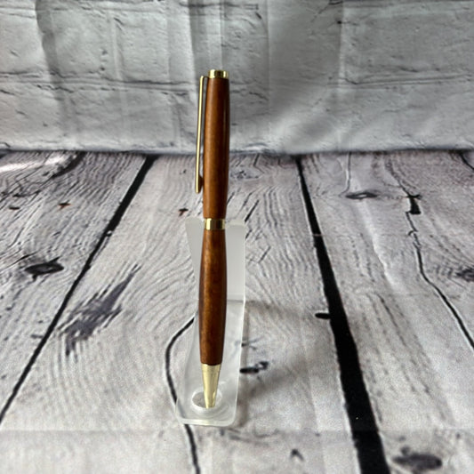 Slimline ballpoint pen with tigerwood and gold fittings
